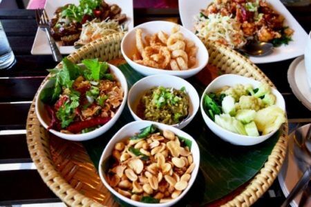 Khantoke Dinner
A traditional way of eating, a round serving tray with a selection of typical northern dishes and sticky rice is shared among guests during dinner.