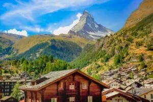 Switzerland: Matterhorn above Zermatt pine woodland in an idyllic valley