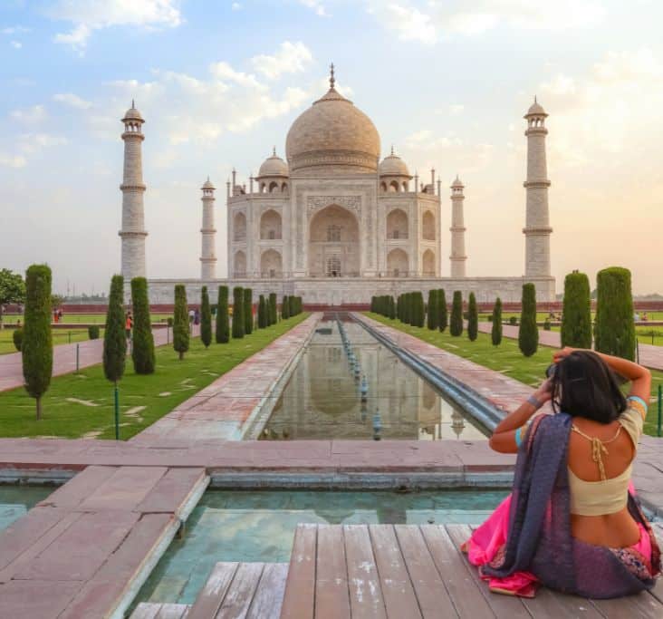 India tour: Experience the timeless beauty of the Taj Mahal, a masterpiece of Mughal architecture. Your local guide will take you on a journey through the history of this breathtaking white marble mausoleum. Built by Emperor Shah Jahan as an eternal tribute to his wife, Mumtaz Mahal, it stands as a testament to his profound love and grief after she passed away in 1631.