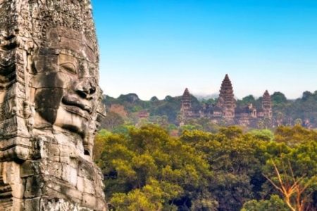 Ancient stone faces of king Bayon, Angkor Wat, Siem Reap, Cambodia