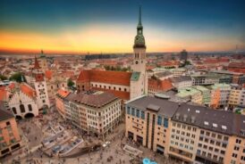 Munich tour: See historic church spires against a backdrop of modern architecture