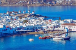 Greece tour: Mykonos Harbor with the Hilltop Windmills