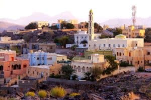 Nizwa is an oasis at Oman’s highest mountains Surrounded by palm trees, it is a popular tourist destination featuring the Nizwa Fort, the largest castle in Oman.