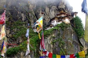 Taktshang Monastery is also known as the Tigers Nest. It clings to a cliff 3,000 feet above the valley floor. A must see in Bhutan tourist attractions.
