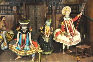 Kathakali dance expresses emotions through hand gestures, facial and eye movements, supported by traditional music, a must-see on India Travel tours.