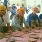 Cultural tours experience in the kitchen at Bangla Saheb Gurudwara, Delhi